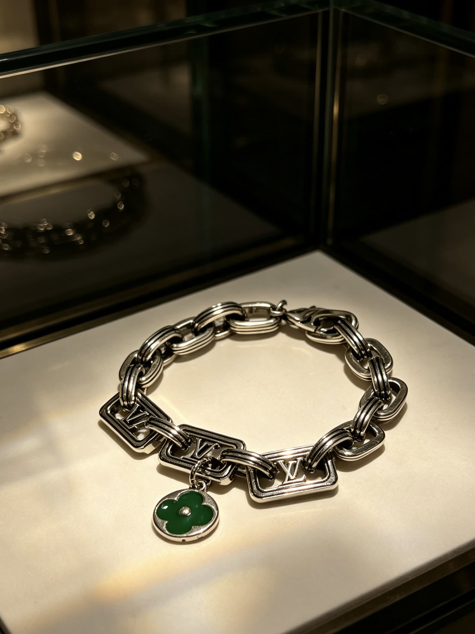 Louis Vuitton Silver Bracelet with Green Clover Charm